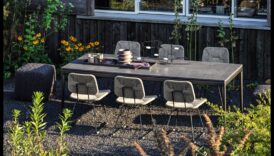 كيف تؤثر المناظر الطبيعية على تصميم مساحات تناول الطعام الخارجية؟